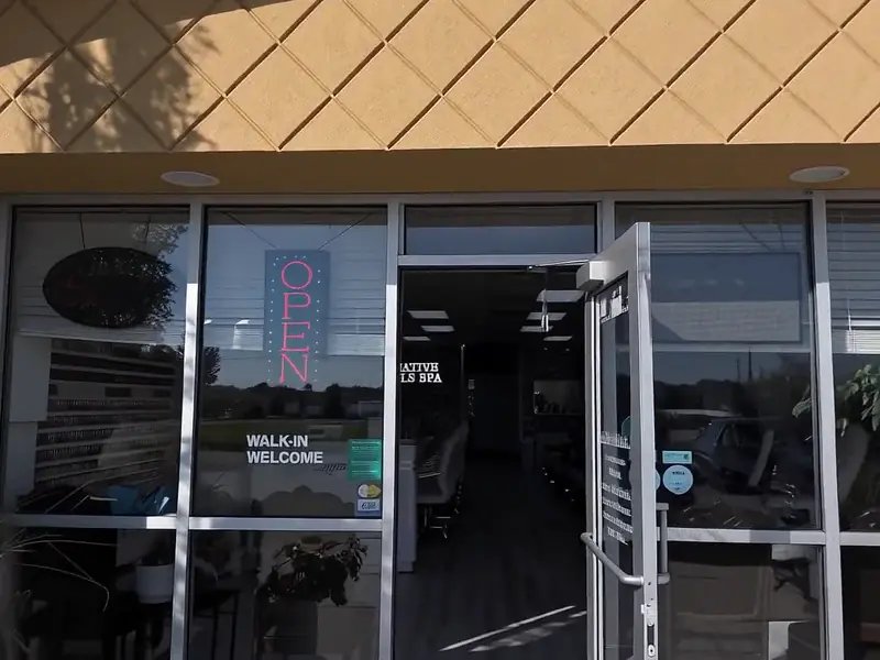 The Creative Nails storefront entrance with its Walk-in Welcome sign